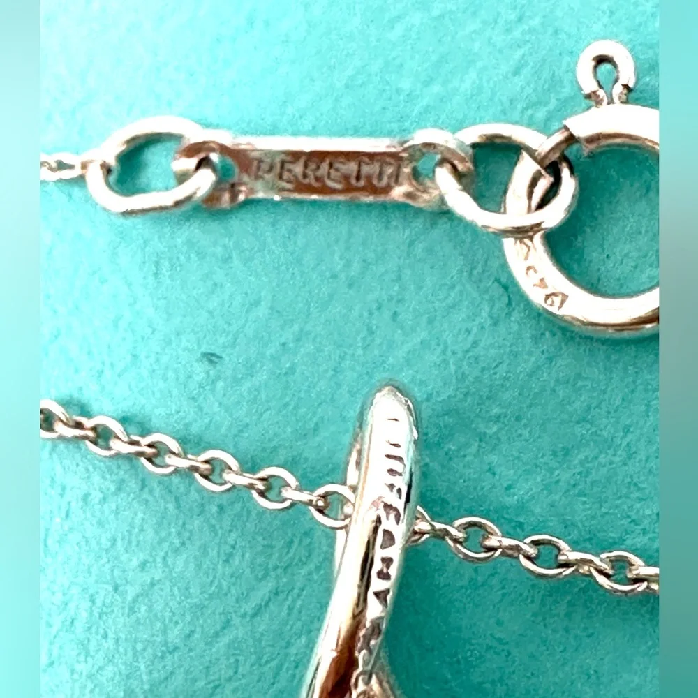 - AuthenticTiffany & CO. Elsa Peretti Infinity Cross Pendant Necklace. - Picture 5 of 11
